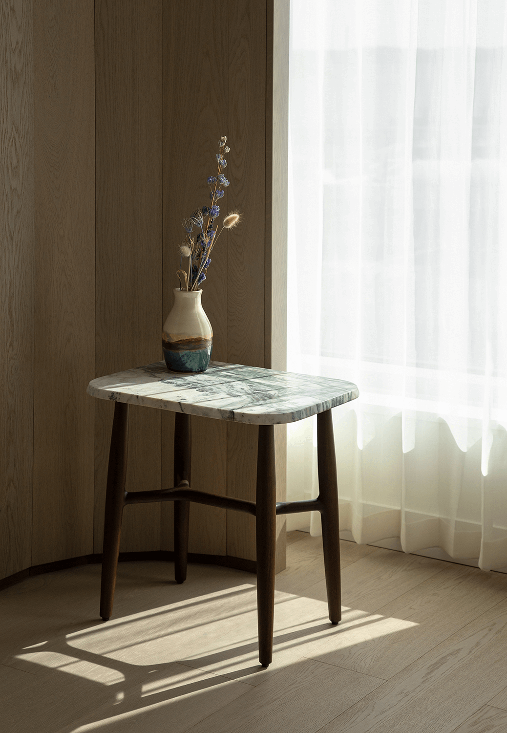 Handcrafted pottery by a Nova Scotia artisan reflects Muir Halifax's commitment to local craftsmanship and a sense of place. Love & War developed the hotel's brand strategy and visual identity, drawing inspiration from the region's natural color palette, materials, and maker culture to create an authentic luxury hospitality experience.