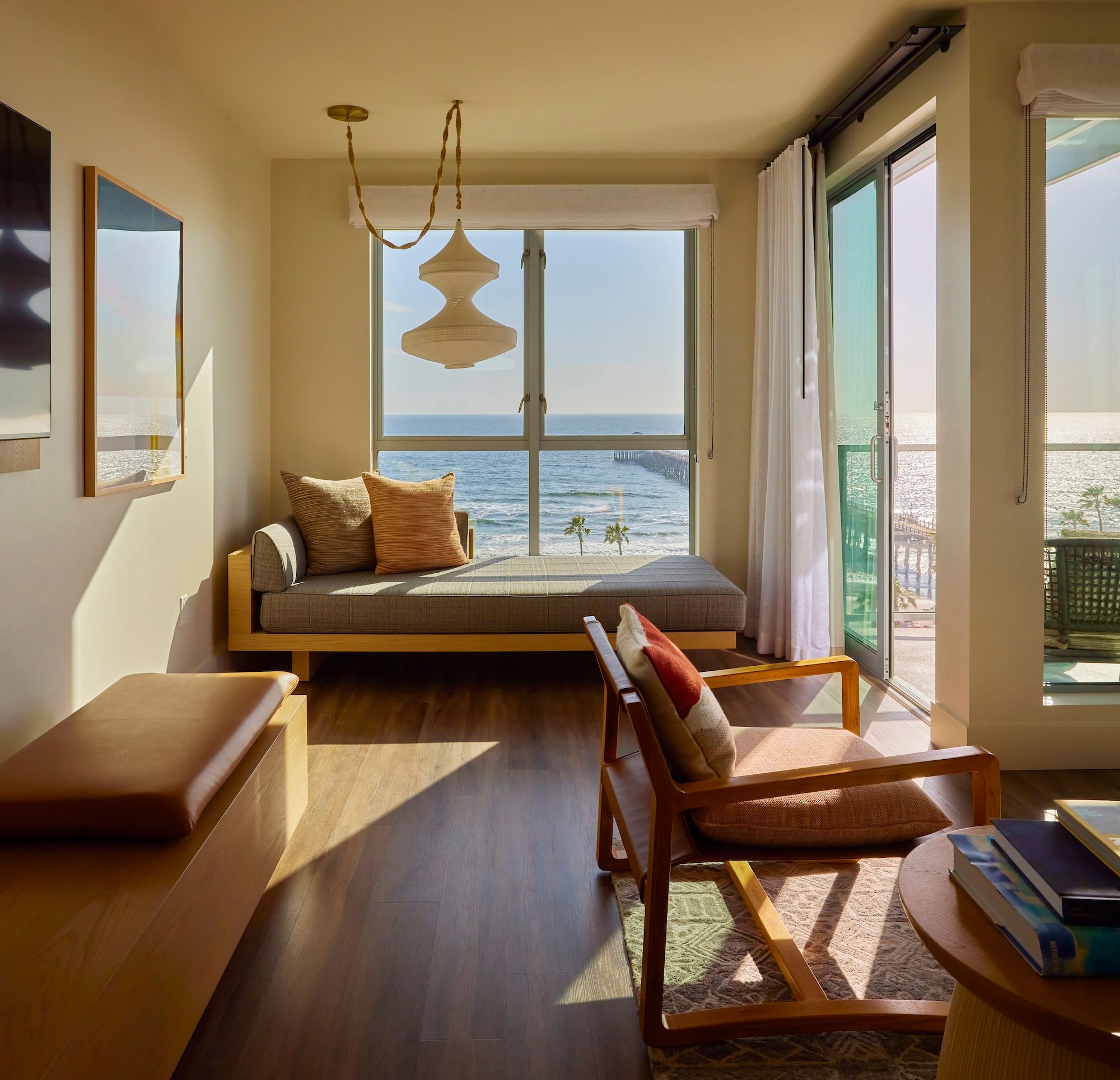 Ocean-view guest room at Mission Pacific Beach Resort in Oceanside, California, featuring warm natural materials, custom furnishings, and a relaxed coastal aesthetic. Love & War developed the hotel’s concept, naming, visual identity, experience design, and marketing, creating a hospitality brand inspired by Southern California living and Oceanside’s evolving creative culture.
