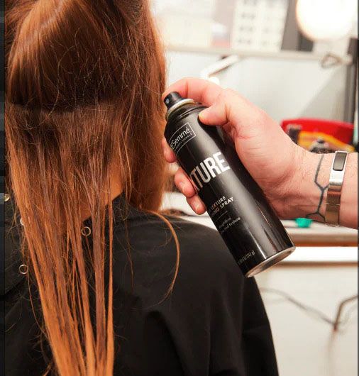 Generously spritz Dry Texture Finishing Spray throughout the hair after blowdrying and then lightly tease strands section-by-section, working from ends to roots.