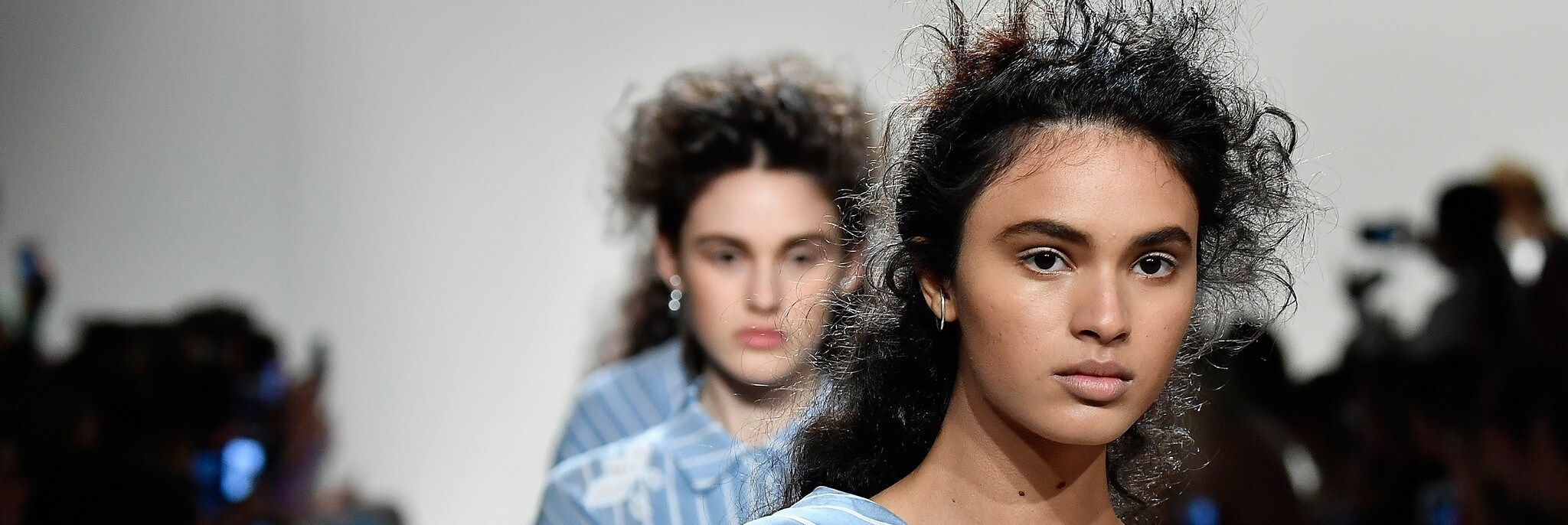 Model with windswept twisted half crown hair