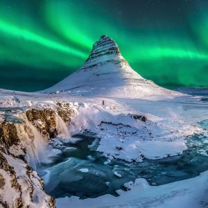 Aurora Borealis over the majestic Mount Kirkjufell 
