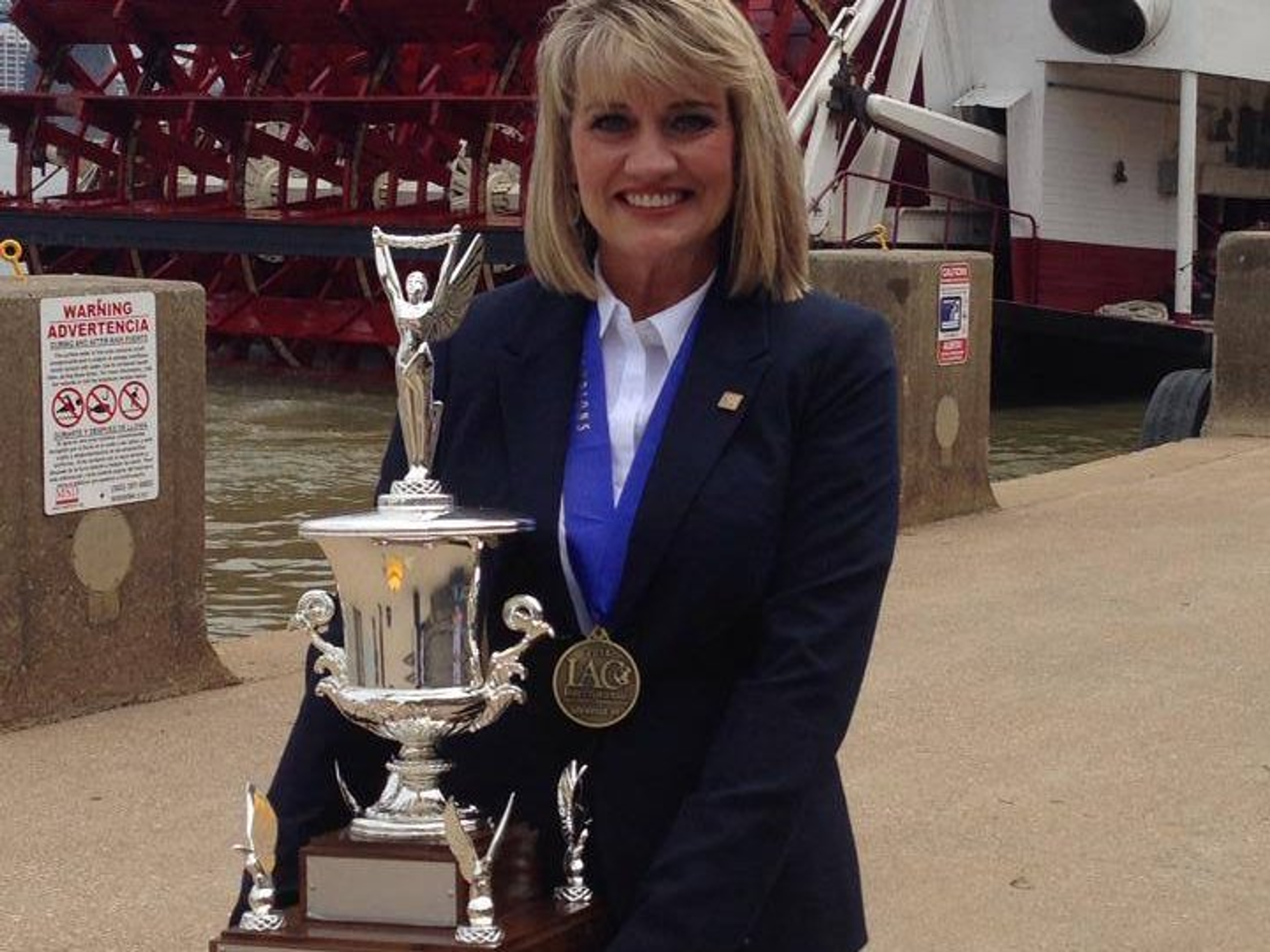 Wendy Lambert Named 2014 (IAC) International Auctioneer Champion