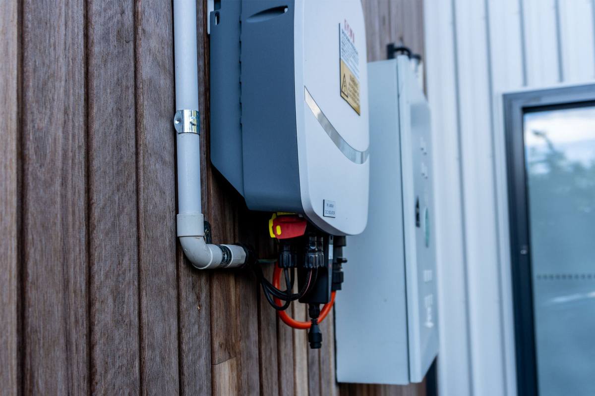 A modern electrical switchboard with circuit breakers and safety switches installed by Voltpro Electrical.