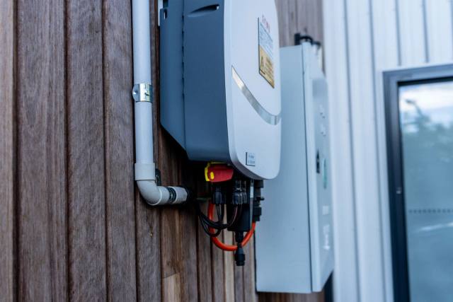 A modern electrical switchboard with circuit breakers and safety switches installed by Voltpro Electrical.