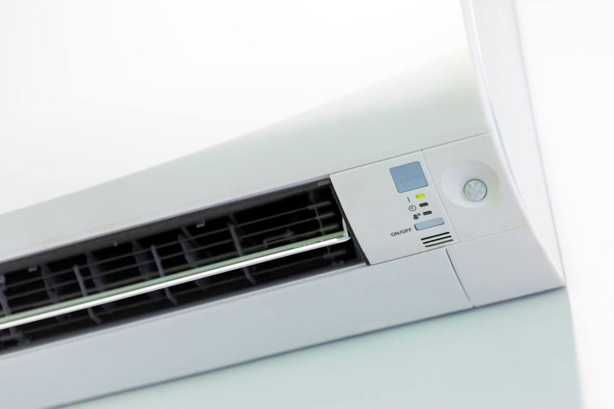 A split-system air conditioner installed on an interior wall by Voltpro Electrical.