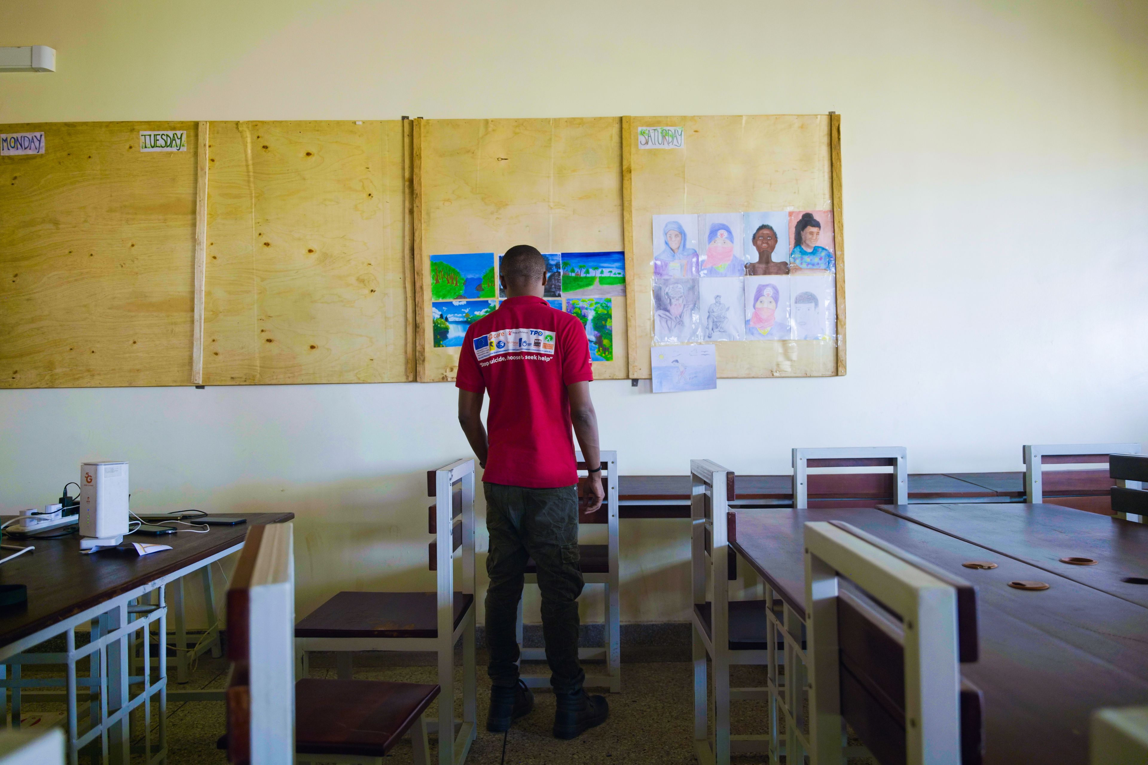 CLH facilitator guiding learners during a literacy session.