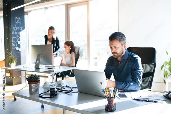 Foto van werkende mensen, ClockWise