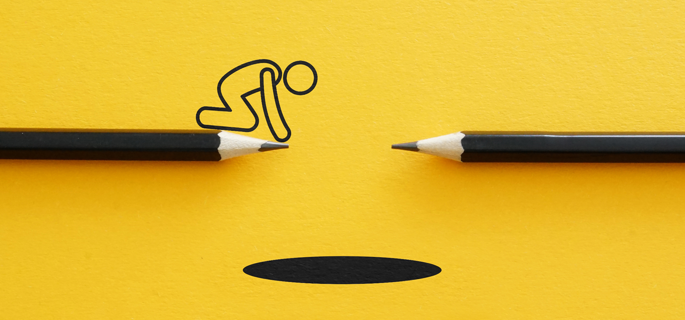 guy on pencil looking into hole