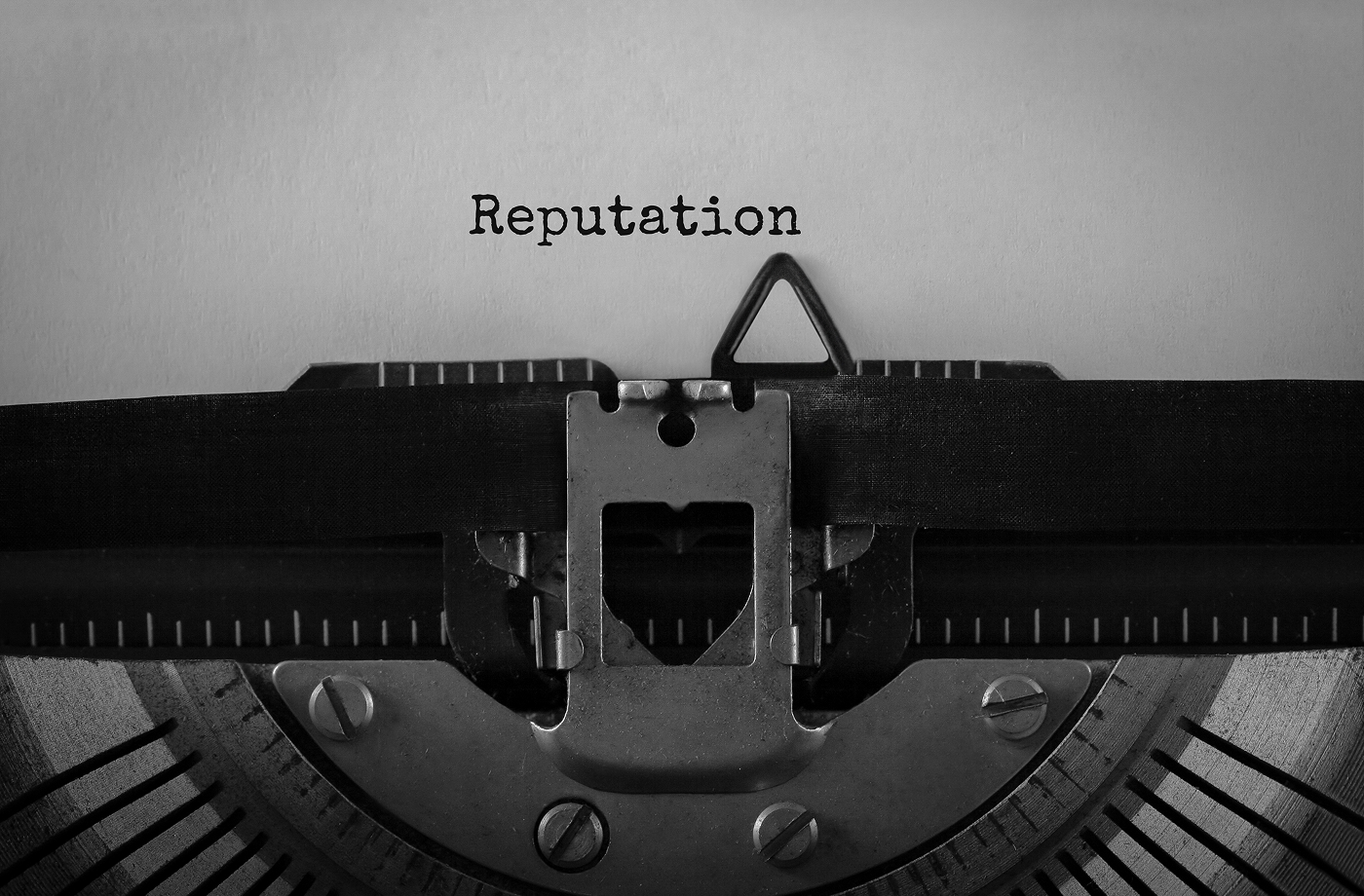 The word reputation typed on a typewriter