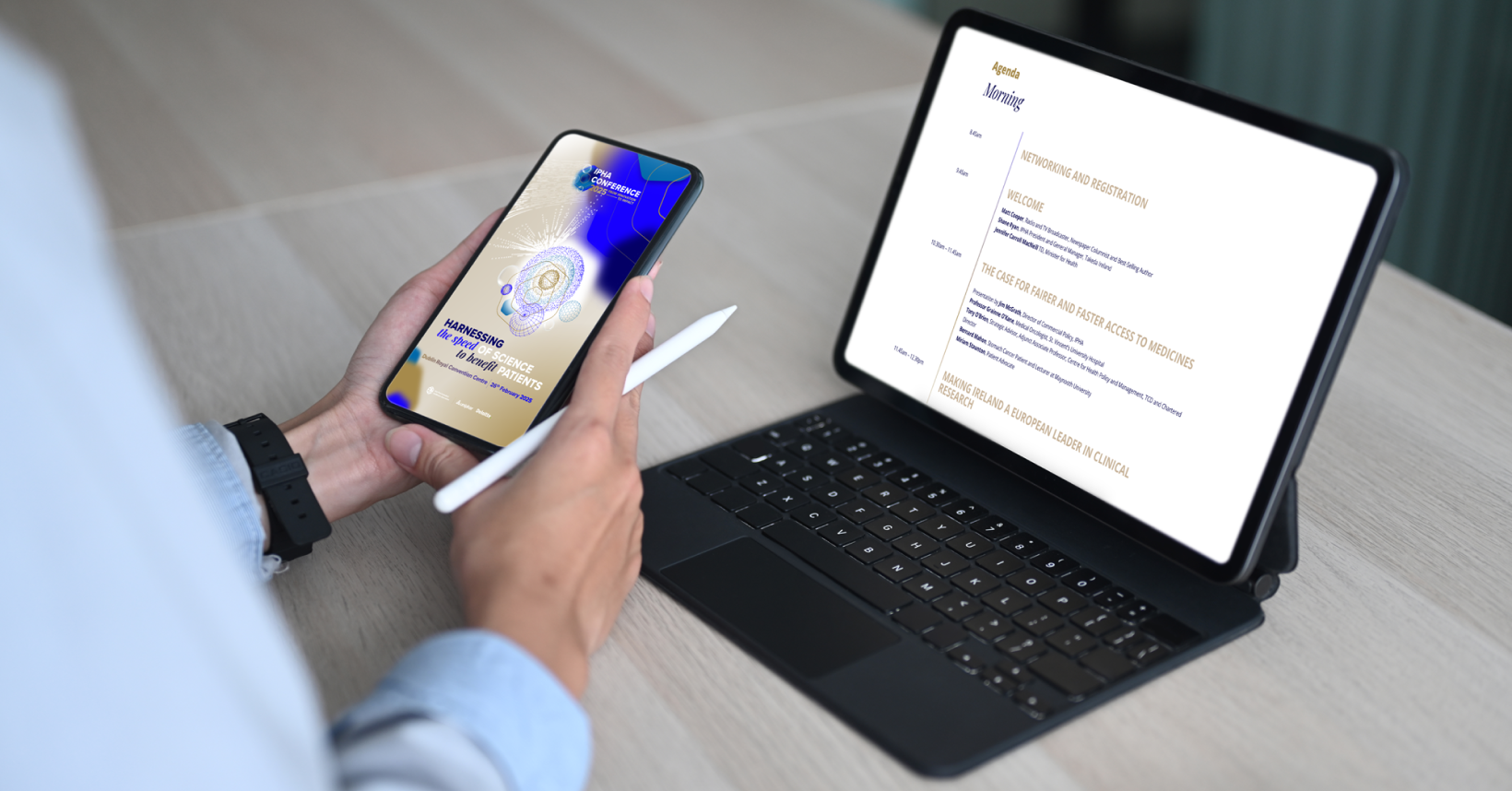Person looking at IPHA Conference 2025 website on mobile