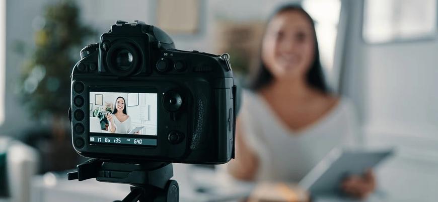 Woman in front of camera