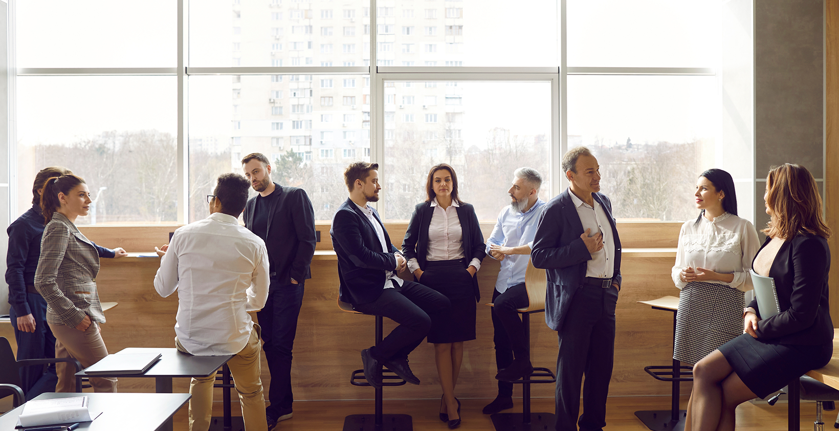 guests standing/sitting around room talking