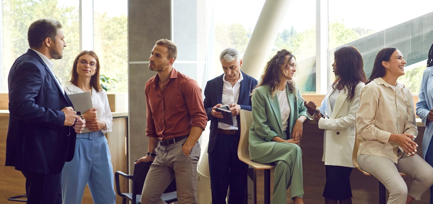 group of people talking at a meeting
