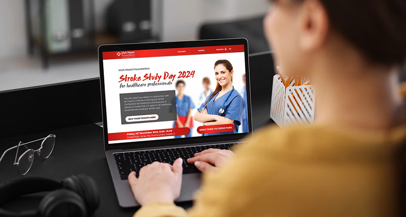 someone sitting infront of event registration website