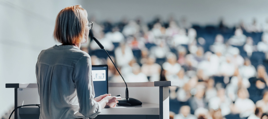 presenting to an event crowd