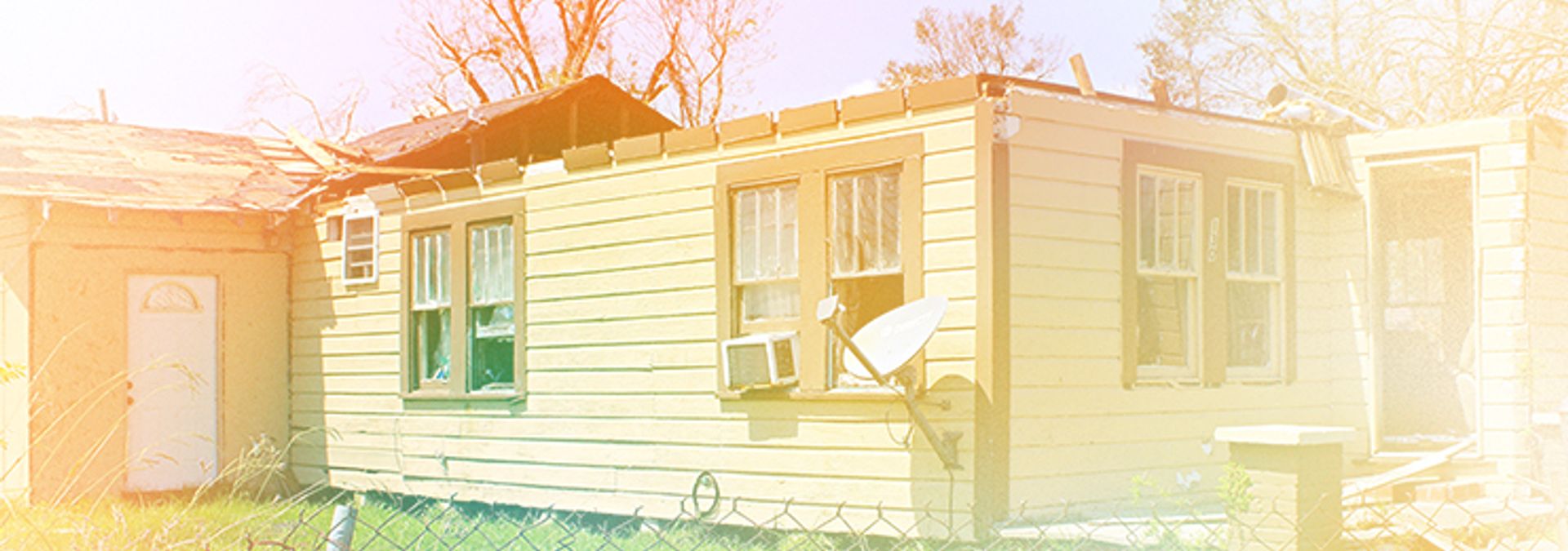 Hurricane Laura ripped the roof of this home in Lake Charles. Photo: 2C2K Photography, modified under CC BY 2.0.