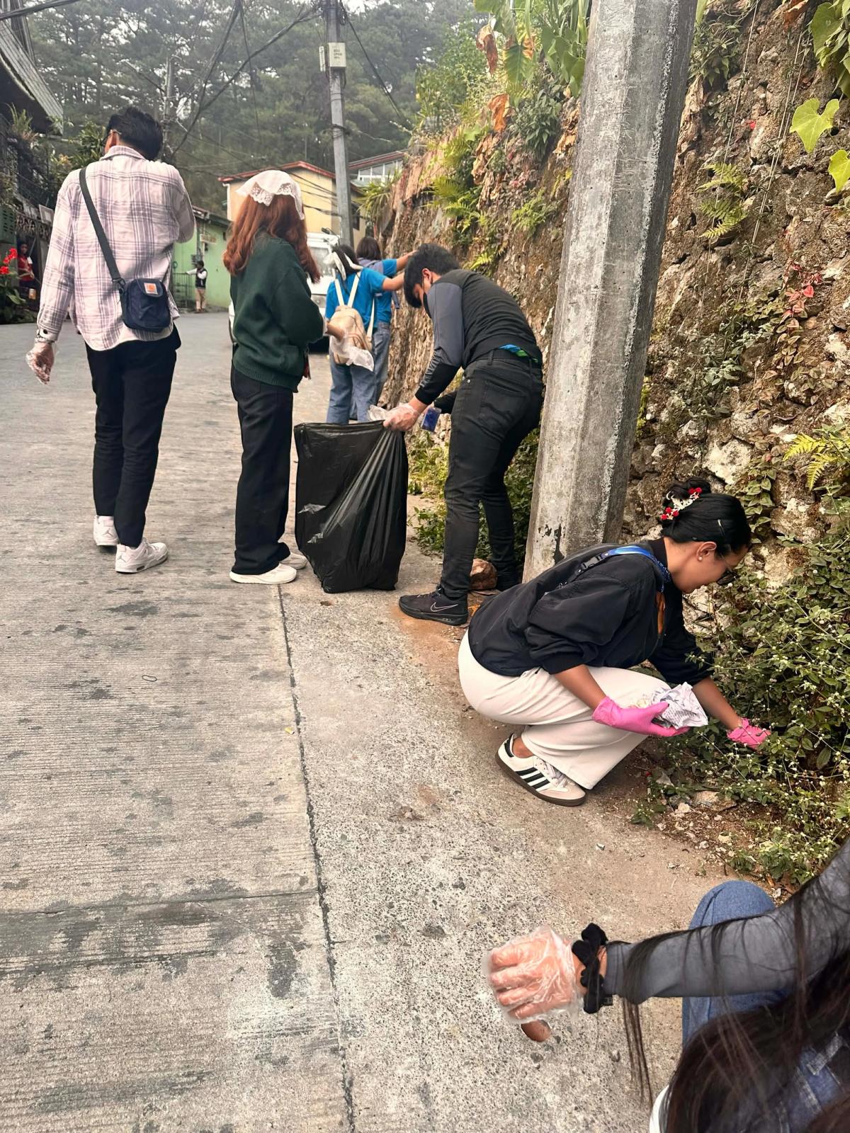 NSTP students cleaning of Sumulong street