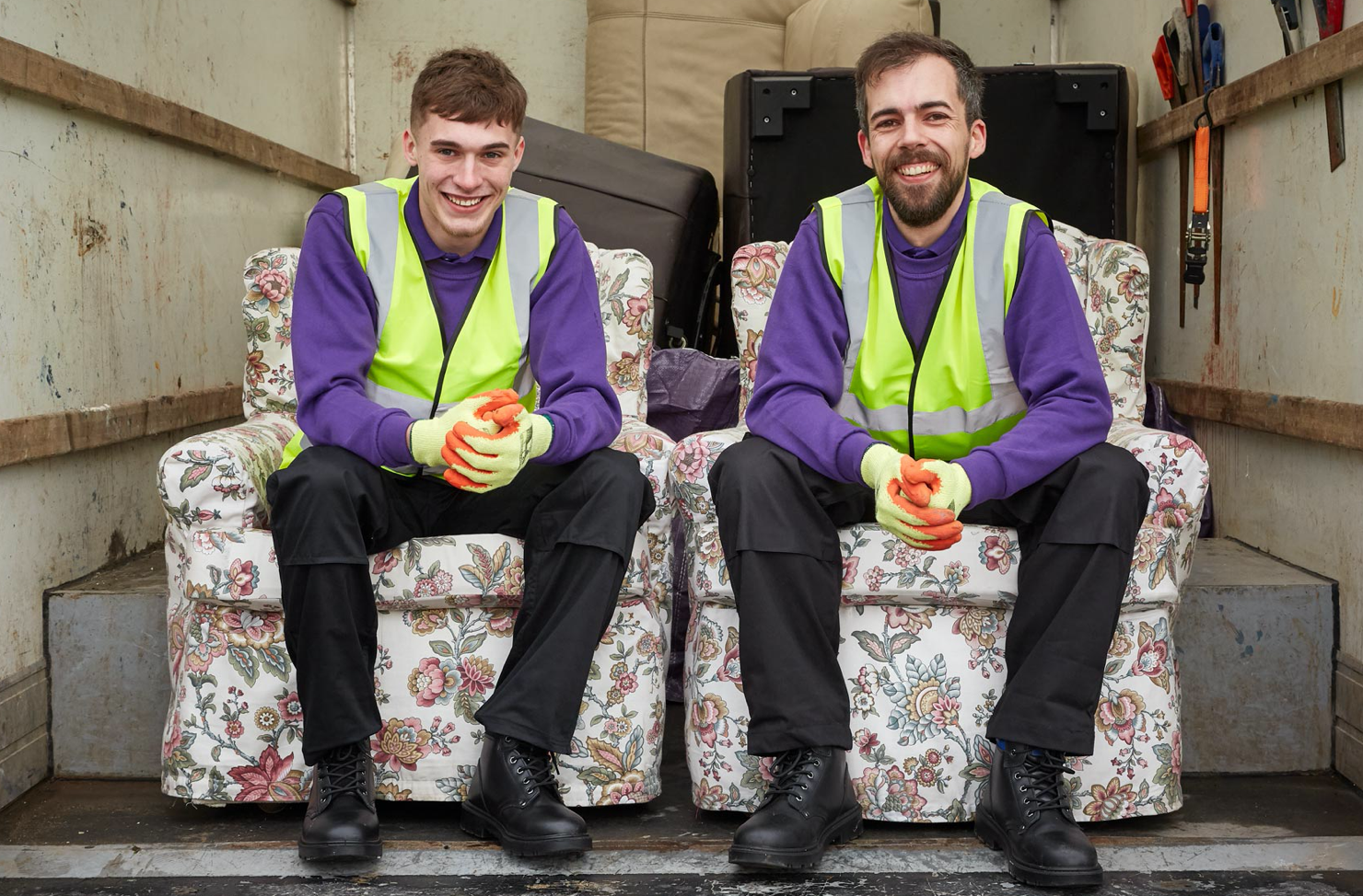 waste operatives in a removal van