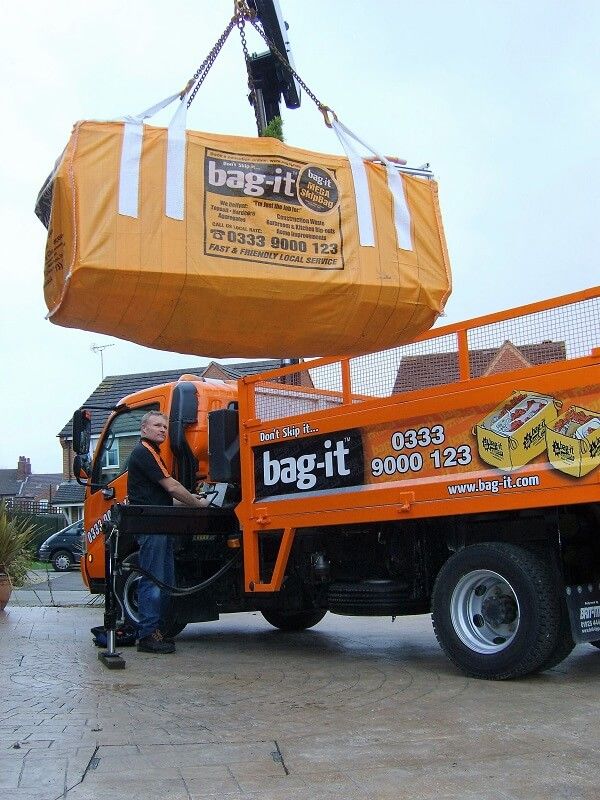 Skip Bag being suspended by a crane