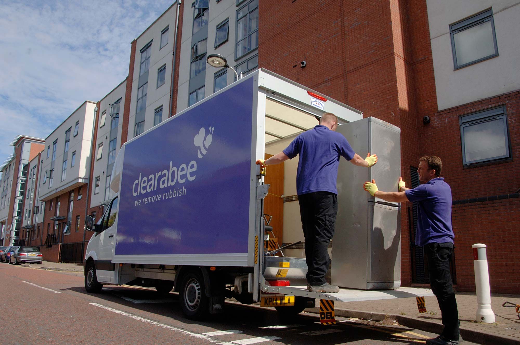 waste operatives loading a van