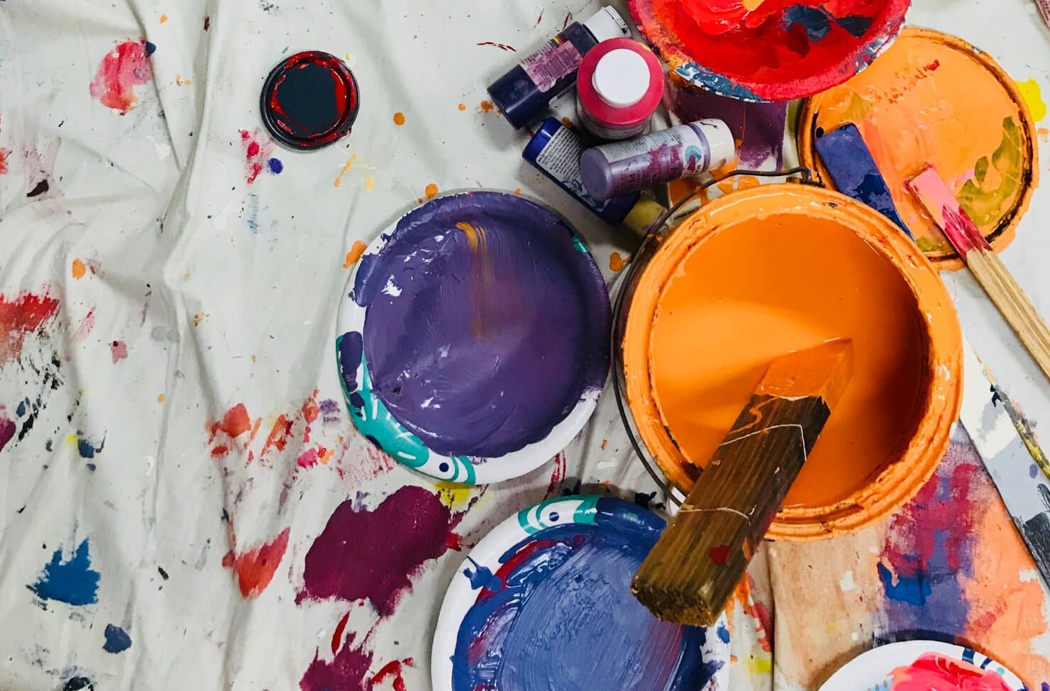 open used paint cans