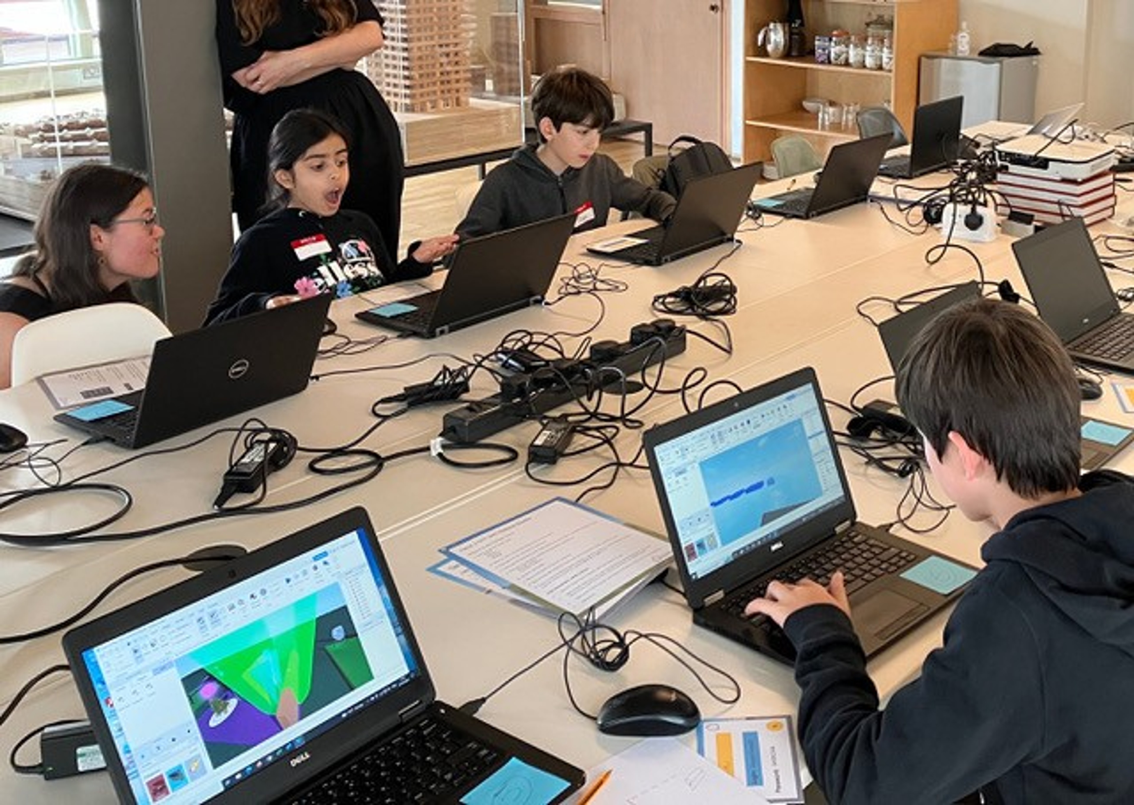 Photo of children using gaming to design play spaces
