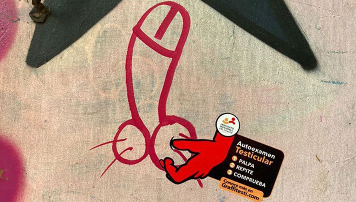 Stickers on male genitalia graffiti explaining how to perform a testicular self-exam