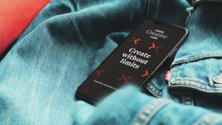 Mobile phone with Creative Labs text reading 'Create without limits'