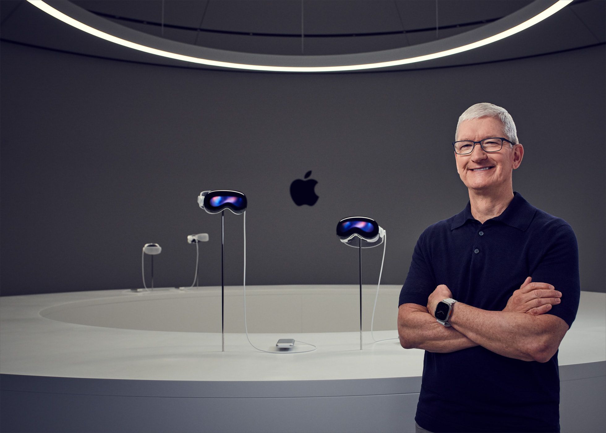 Tim Cook with Apple headsets