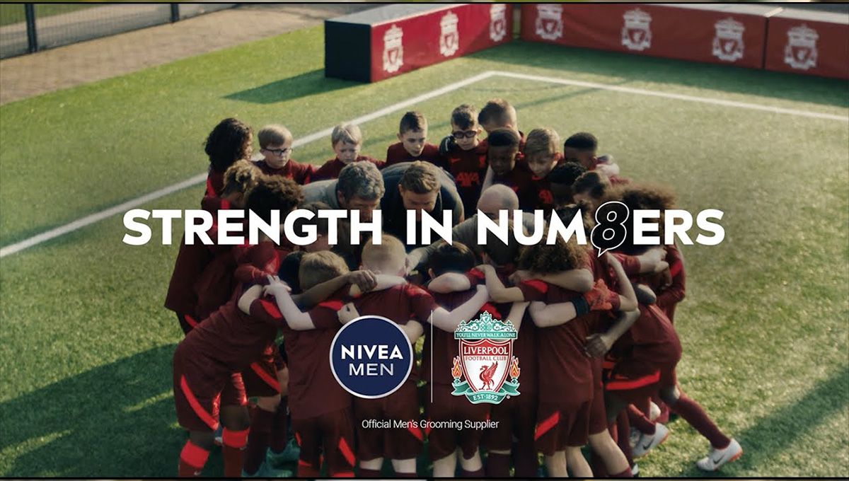 Nivea campaign showing Liverpool FC U8 Academy in a huddle on the pitch