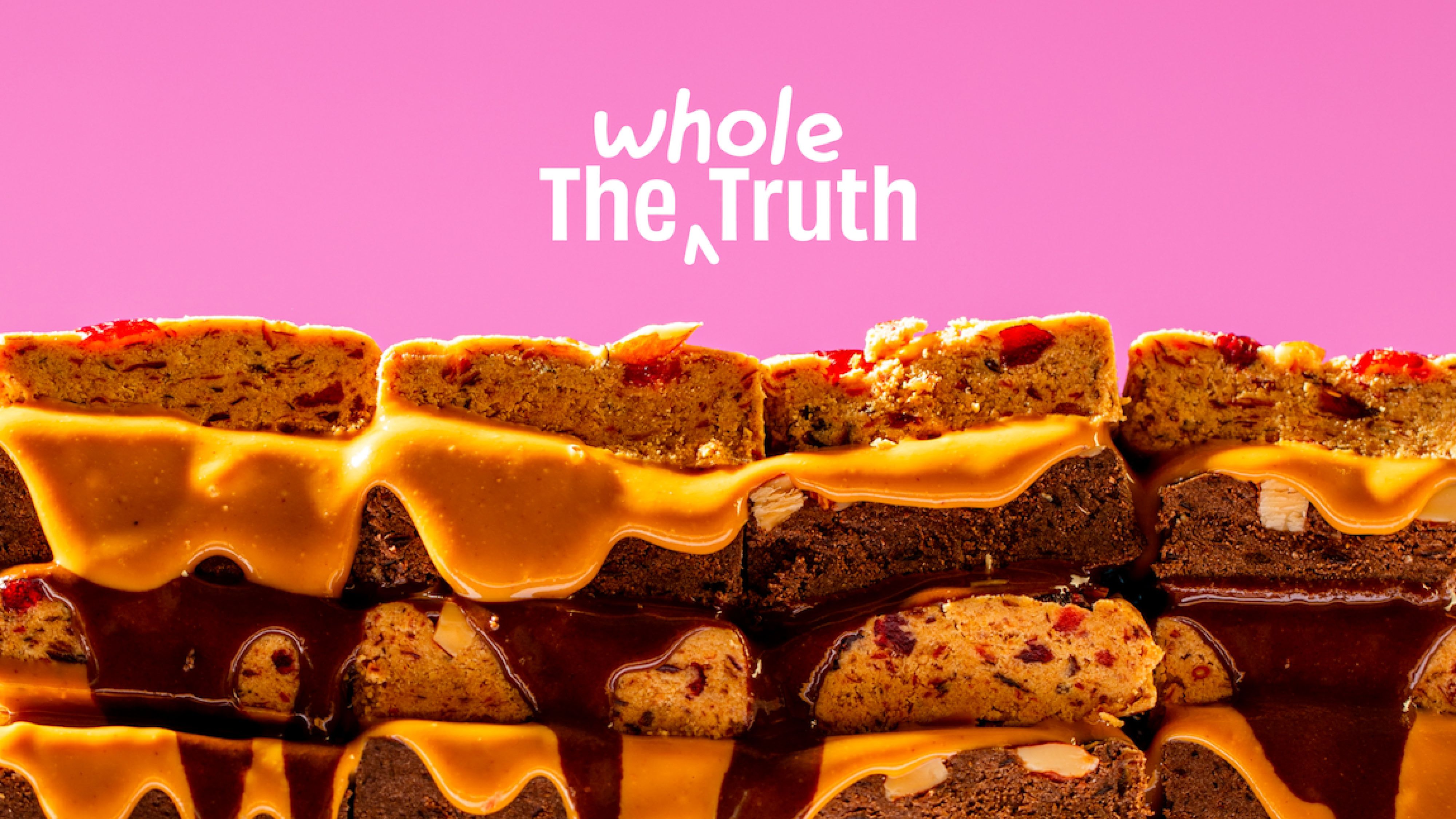 Peanut butter sandwiches on pink background