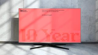 A TV with a title screen from a branded presentation