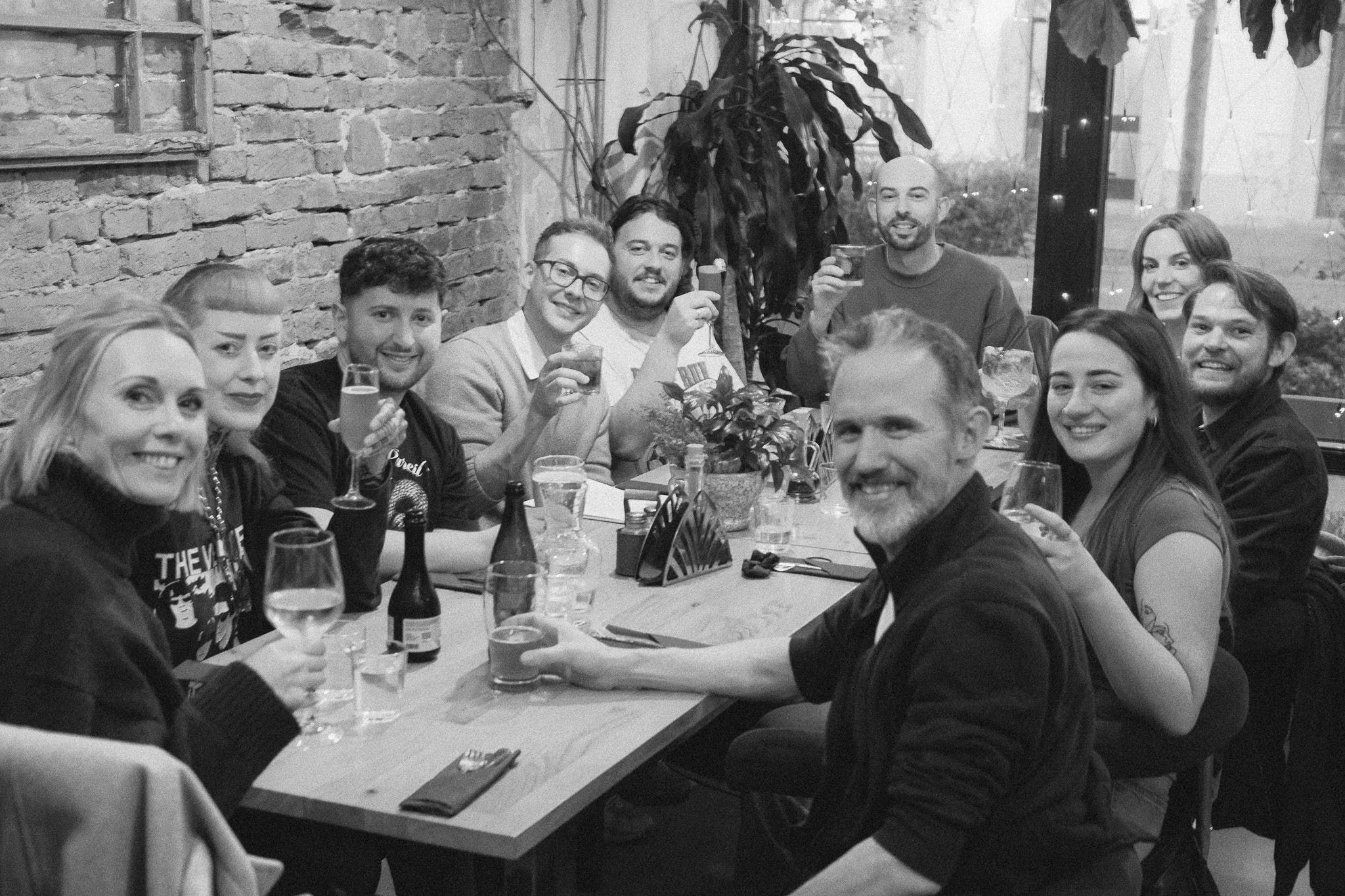 Team out at dinner sat around a big table