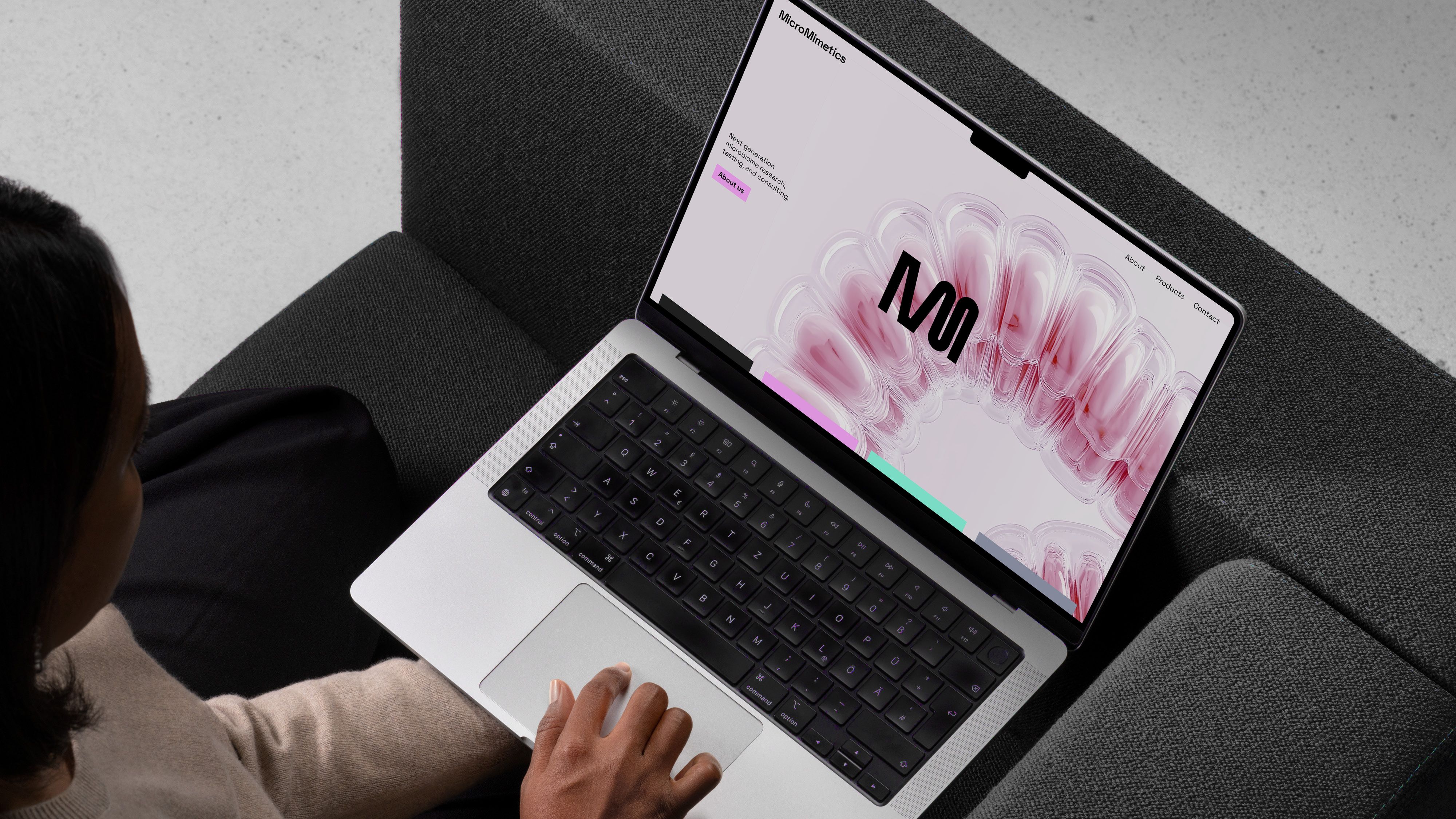 Laptop with MicroMimetics website displayed