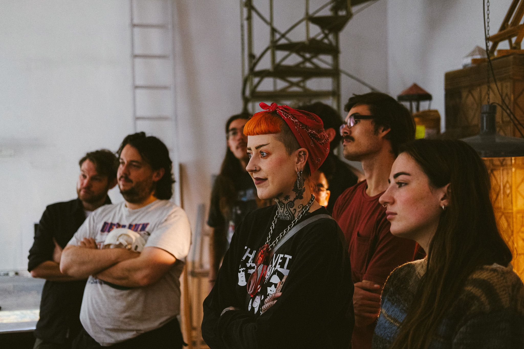 Team intently listening to how to create stained glass artworks