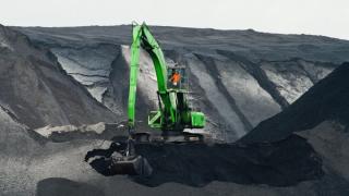 Green loader truck moving for coal in a mine