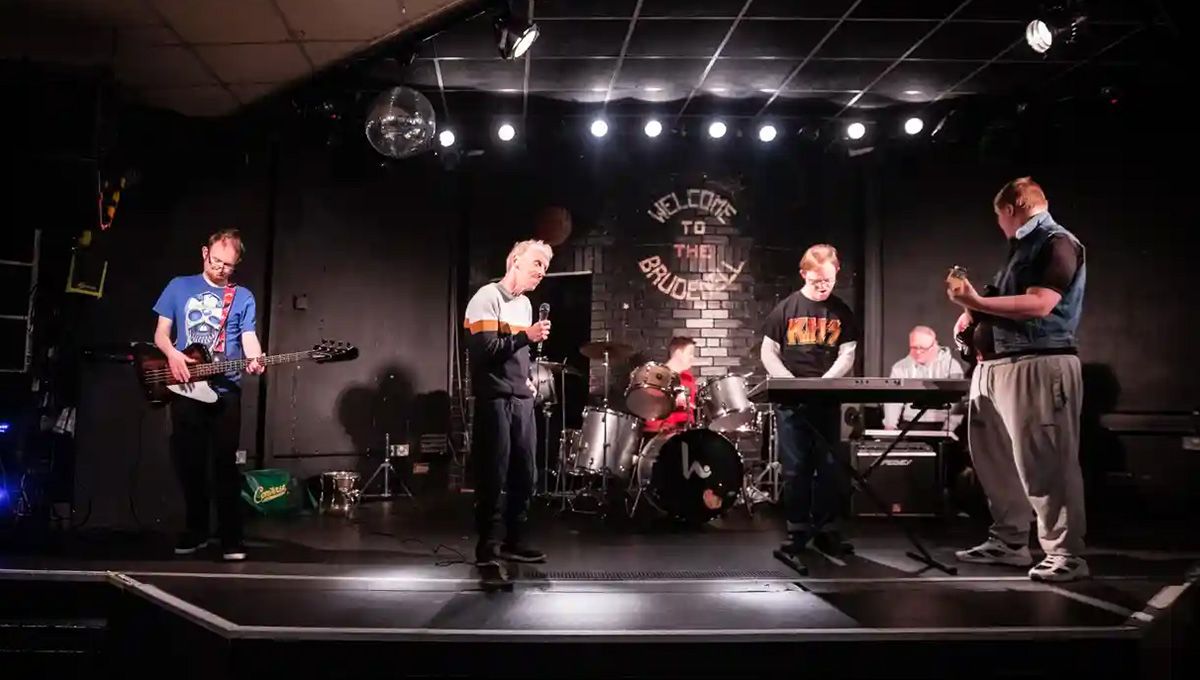 Post-punk band 'Ultimate Thunder' performing on stage