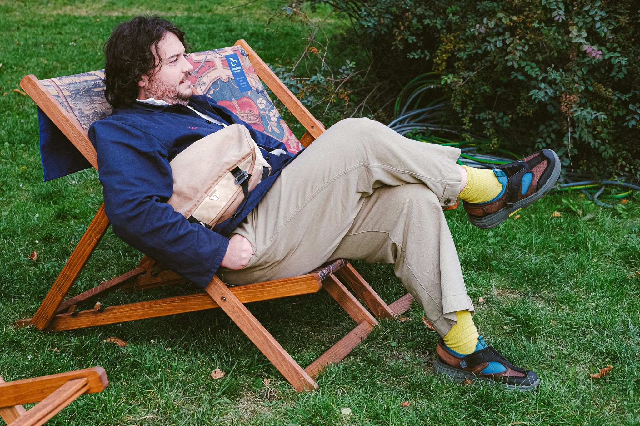 Man sat on a deck chair