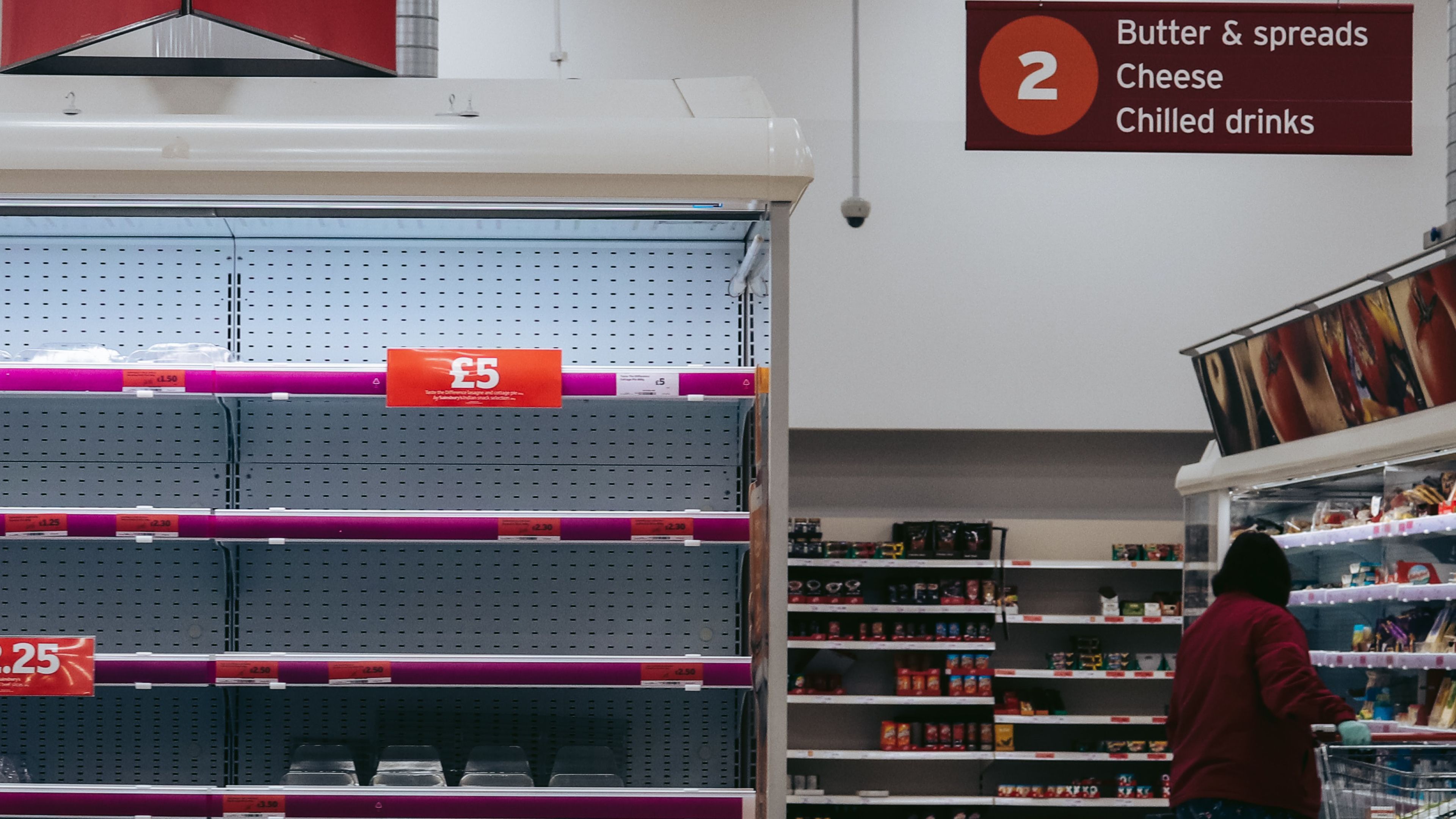 shelves inside of a grocery store