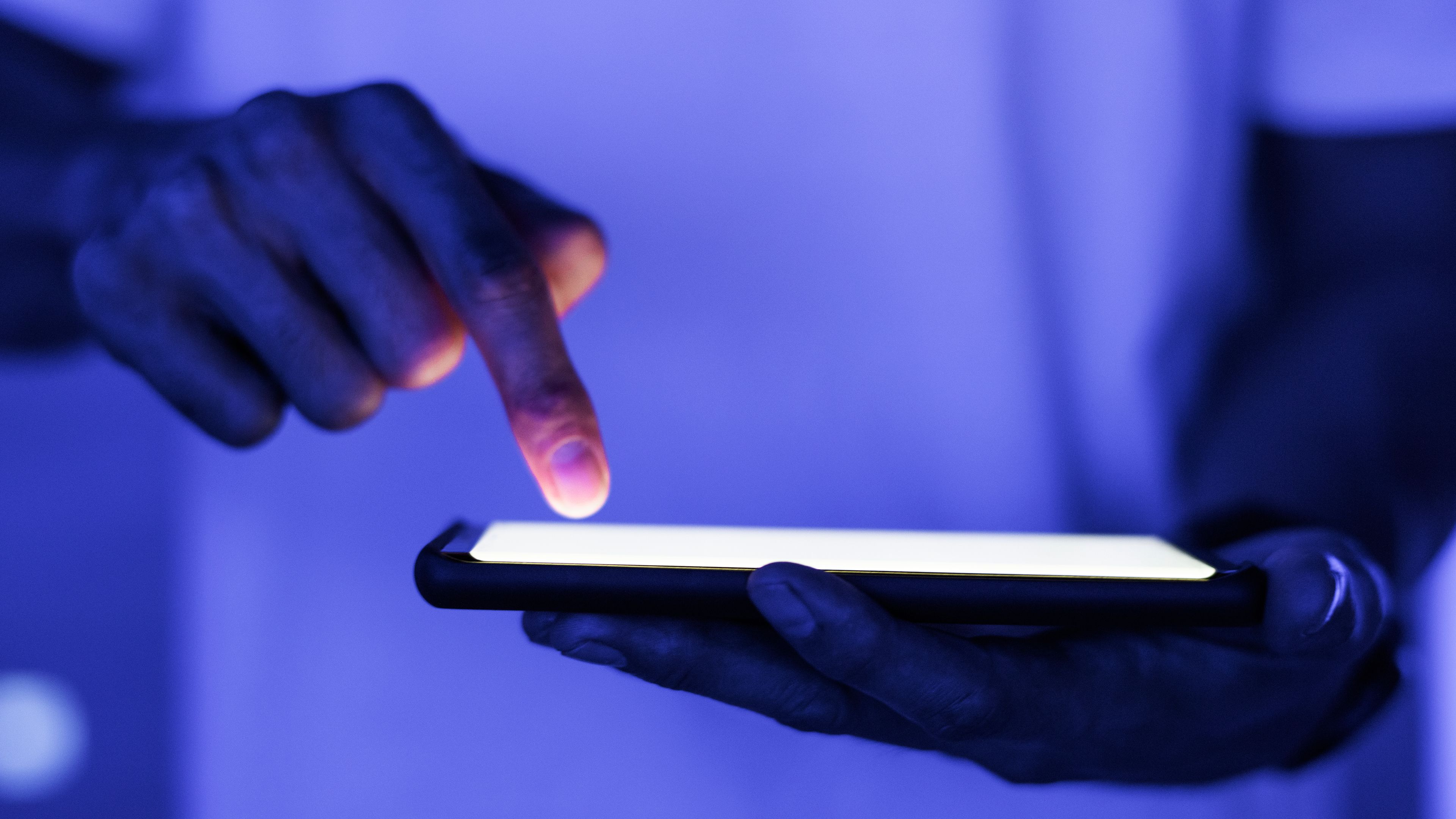 Person interacting with a tablet device