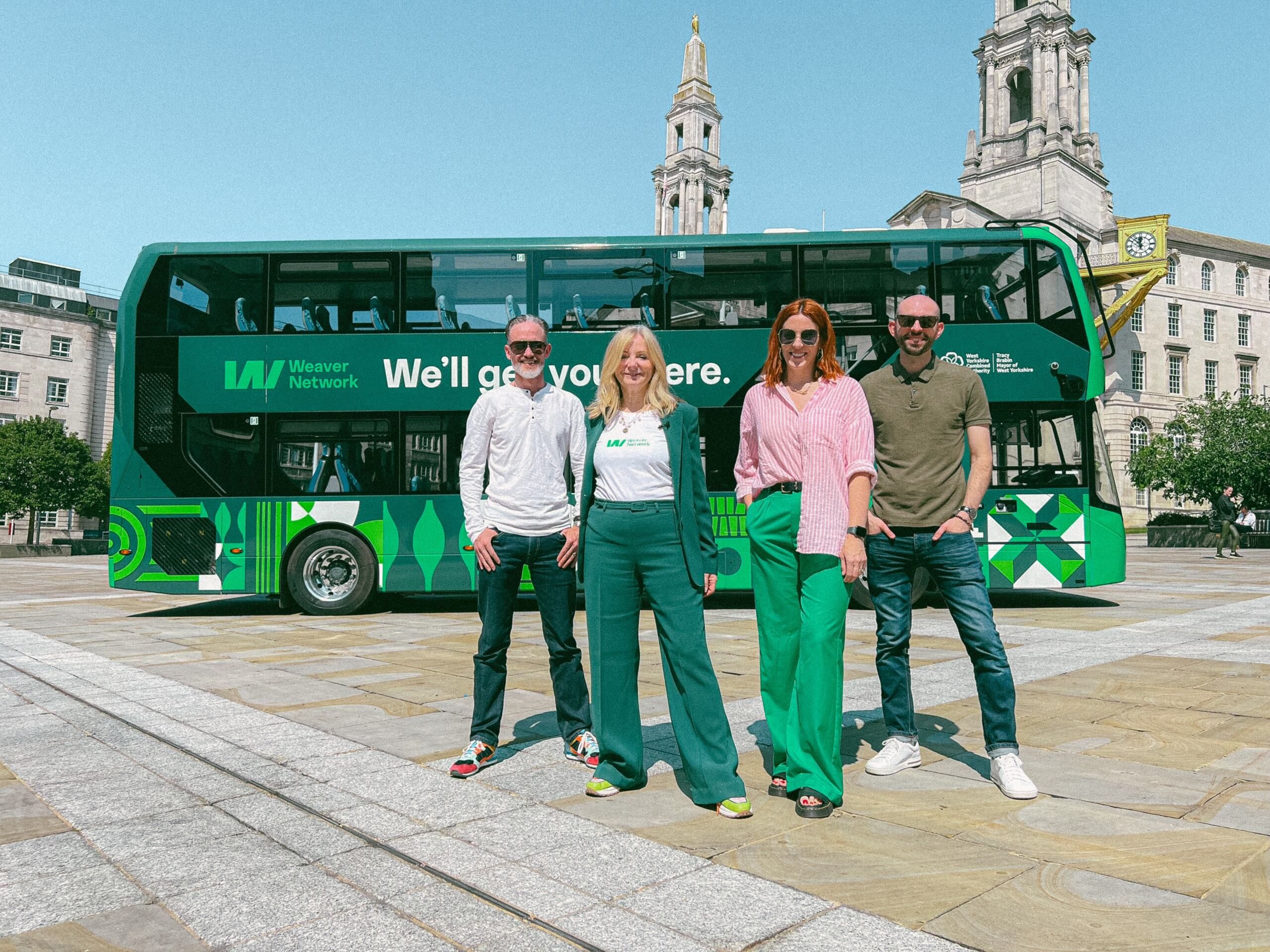 Directors Rachel Burrell-Cook, Chris Skelton and Paul McGuigan, stand alongside Mayor Tracy Brabin, in front of a Weaver branded bus