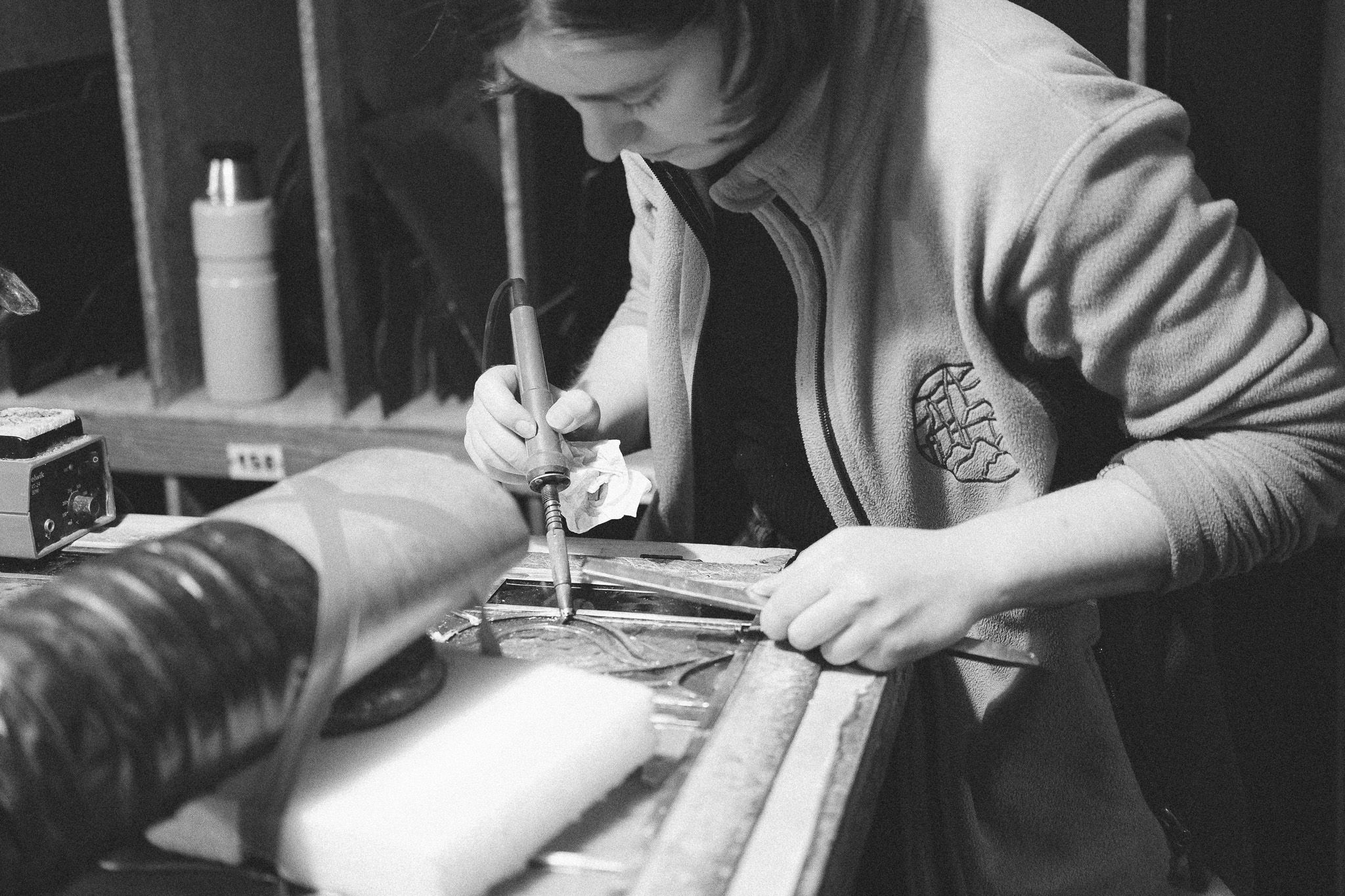 Craftsperson making stained glass windows