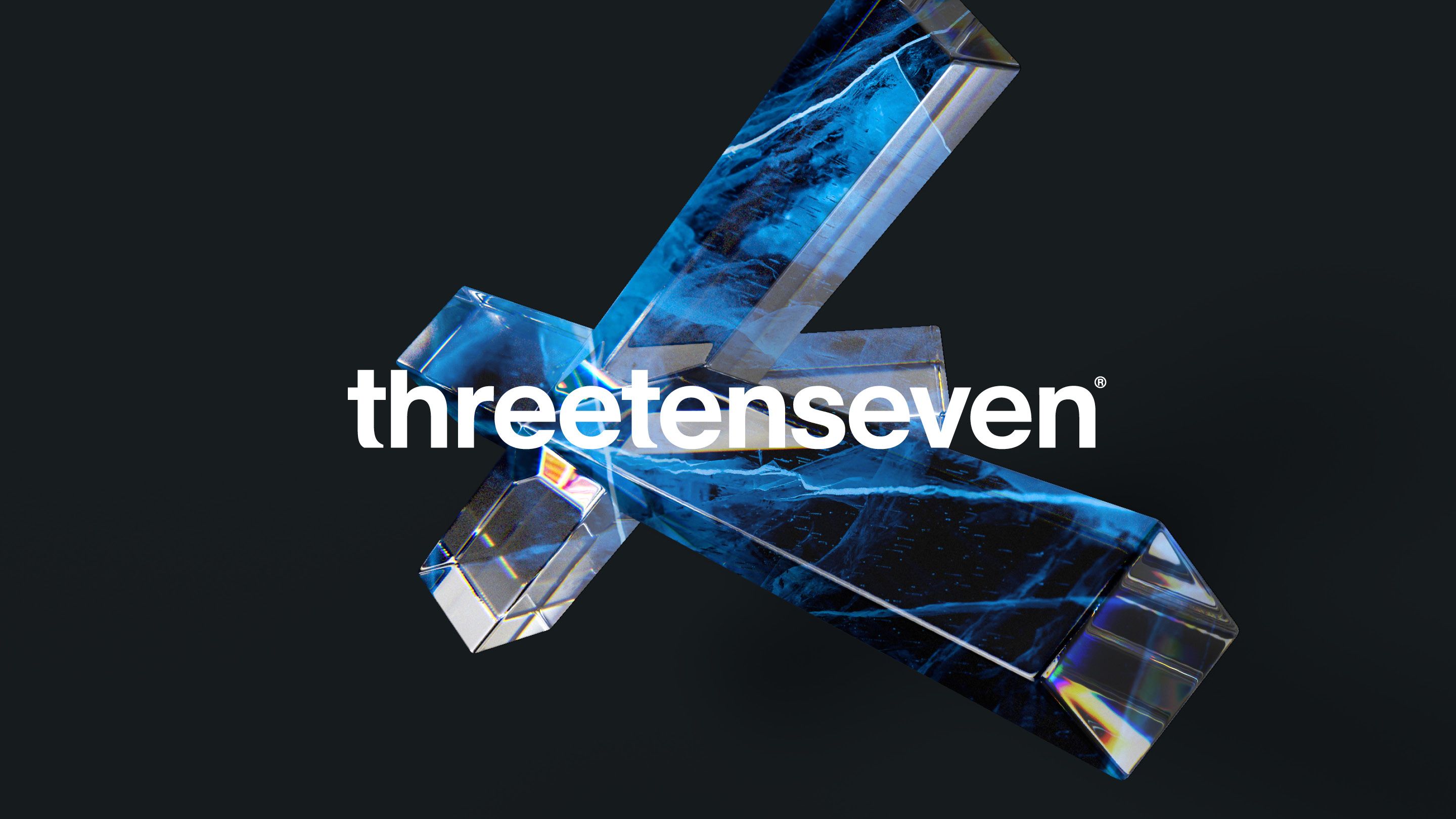 ThreeTenSeven logo over the top of an interesting 3D shape filled with orange and blue textures