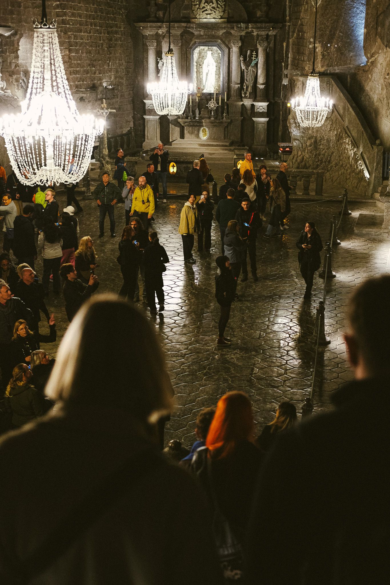 Walking down steps into the salt mine cathederal
