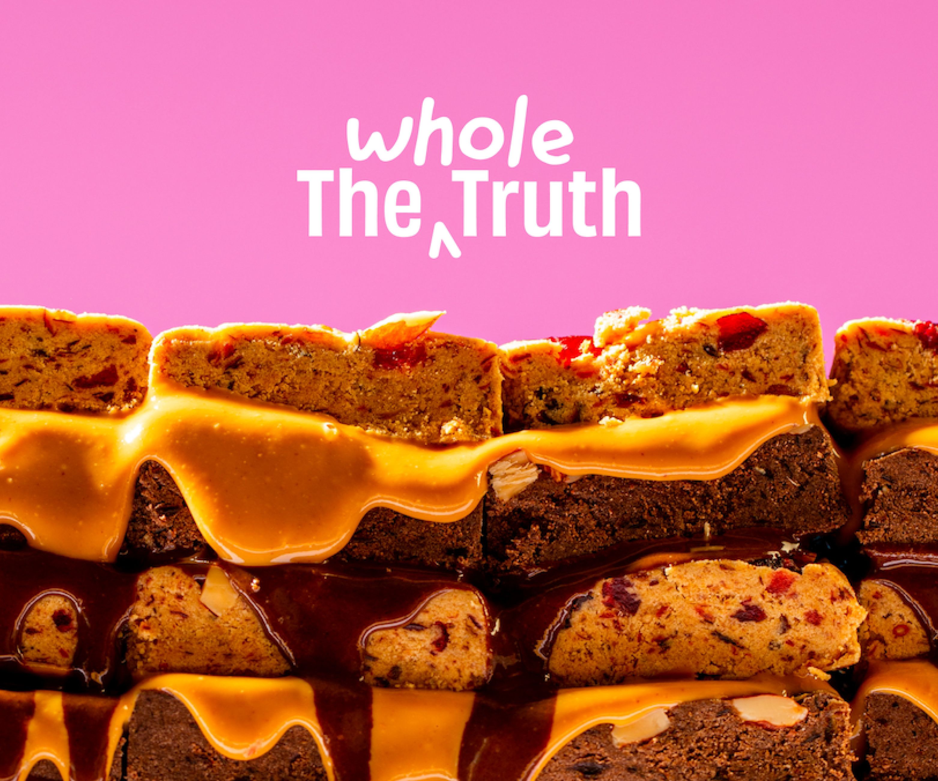 Peanut butter sandwiches on pink background