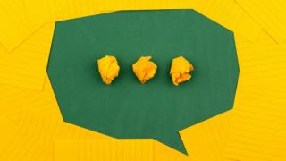Speech bubble made of yellow sticky notes