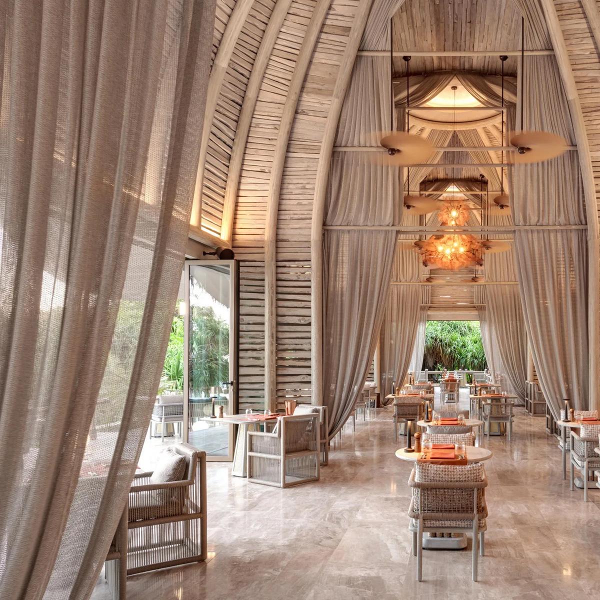 The interior dining room at FLOW, Joali Being — the Wine Cellar has no dedicated published photo, so this interior view of its host restaurant stands in here