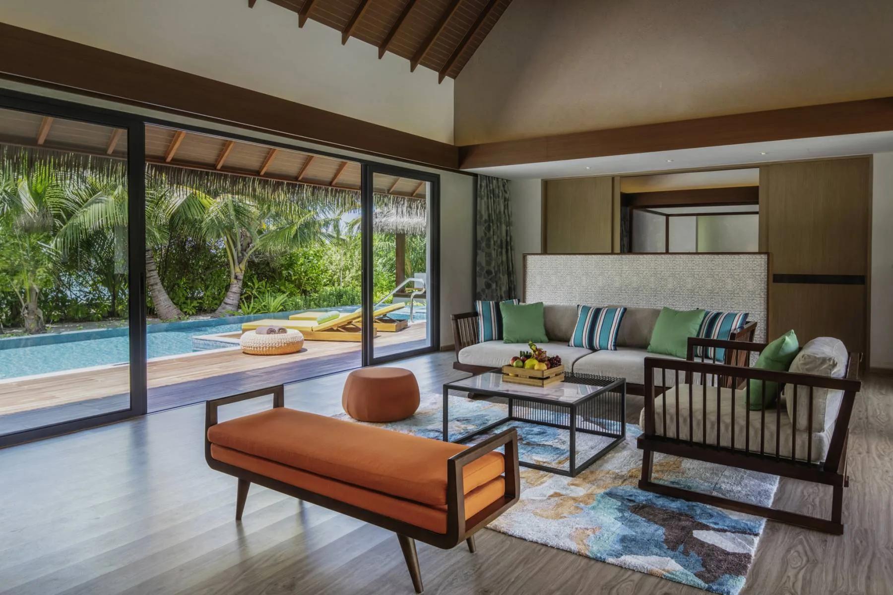 The exterior deck and pool of a Two Bedroom Beach Pool Villa