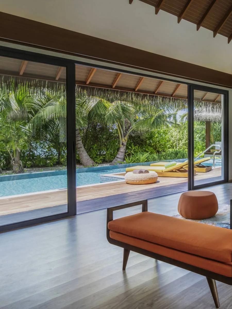 The exterior deck and pool of a Two Bedroom Beach Pool Villa