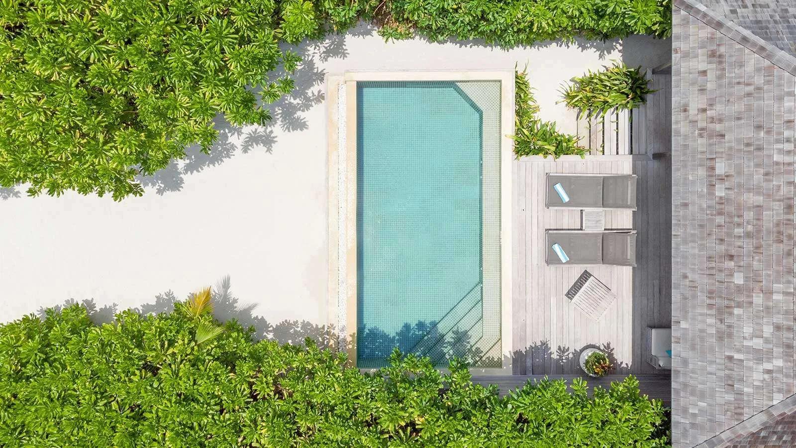 A Beach Pool Villa's private infinity pool and sun deck, seen from directly above